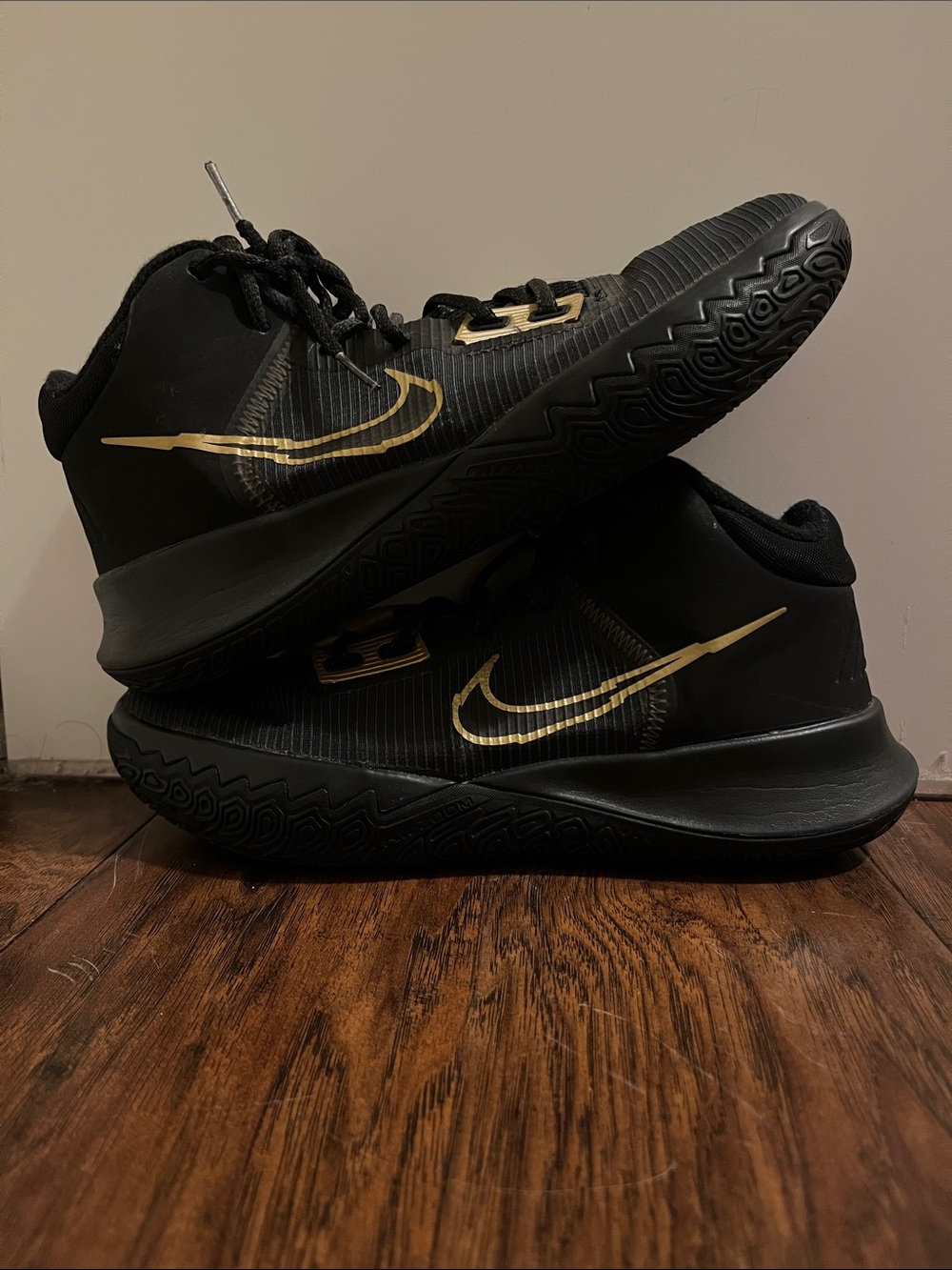 Nike Black Kyrie Irving Basketball shoes with Gold Swoosh Accents